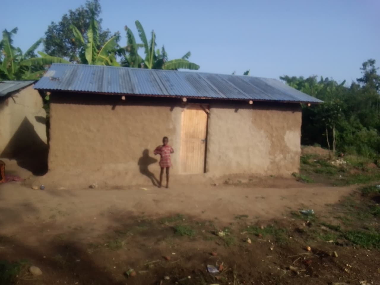 Widow's new home after reconstruction, front view